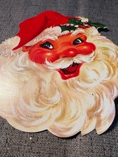 vintage mid-century die-cut cardboard Santa Claus face wall decoration