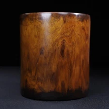 Collected rosewood round pen holder