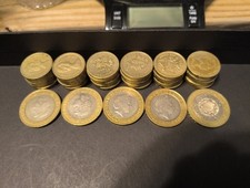 British One Pound , 2 Pound And 20pound Bill With Various Other Coins. 67 Pounds
