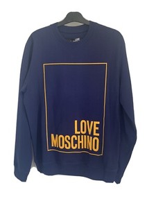 yellow moschino jumper