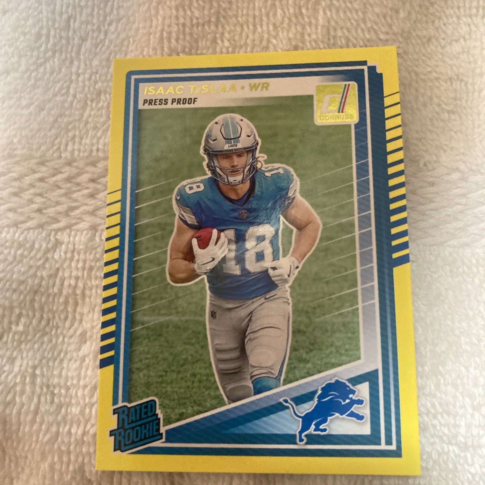 2025 Donruss Football #338 Isaac Teslaa, Rated Rookie Yellow Press Proof