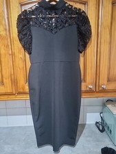 Excellent black short laced sleeved higher neck dress size 14 from Malabay