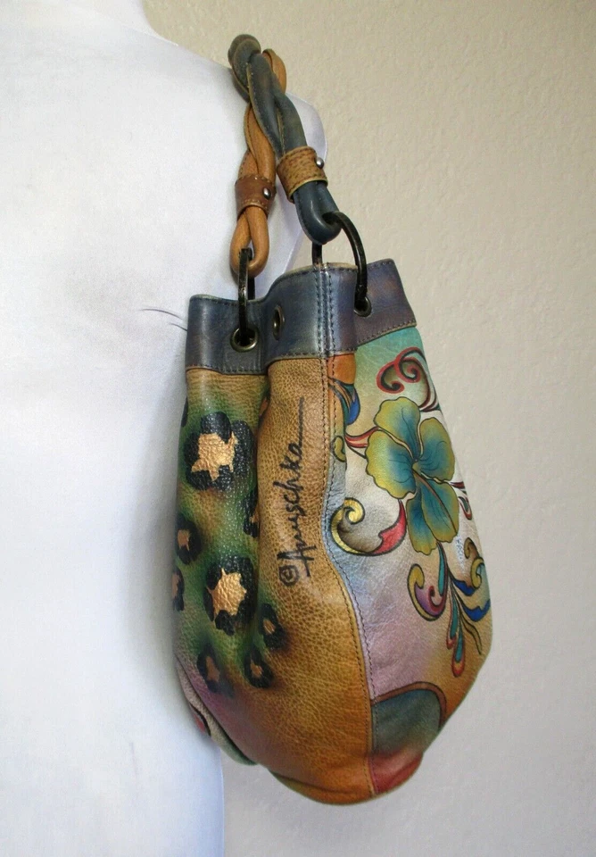 Bolso de mano de cuero Anuschka plumas de pavo real mariposas flores Foto 2 de 4