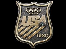 IA13108 VINTAGE 1980 CUT-OUT 1980 USA OLYMPICS BADGE BUCKLE