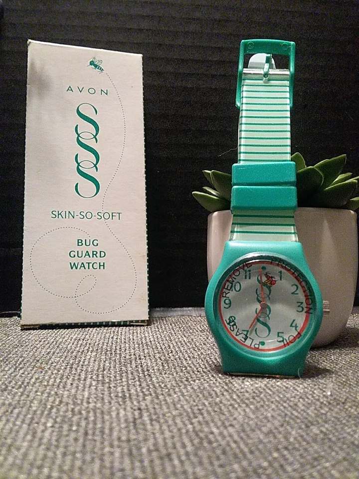 Reloj Avon Skin-So-Soft Bug Guard 1997 de colección NUEVO STOCK ANTIGUO☆ARTÍCULO DE COLECCIONISTA RARO☆ Foto 3 de 4