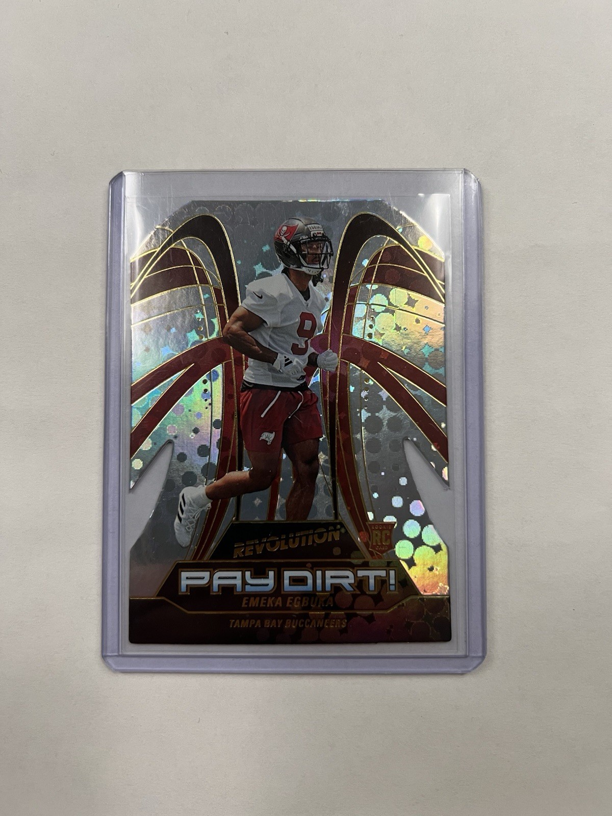 2025 Panini Revolution - Pay Dirt! Emeka Egbuka #3 (RC)