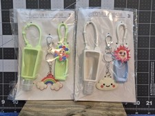2 Packs Of Bottle Bundles: Lip Balm Holder, Key Chain, and Hand Sanitizer Holder