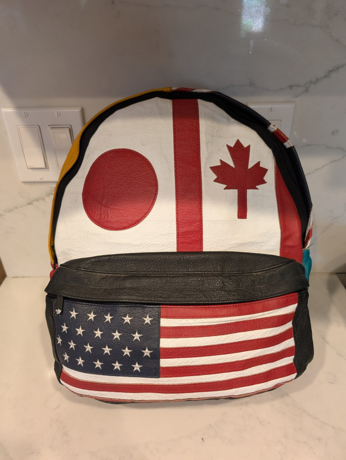 VTG Wilson’s Leather Backpack Patchwork Bag Flag … - image 1