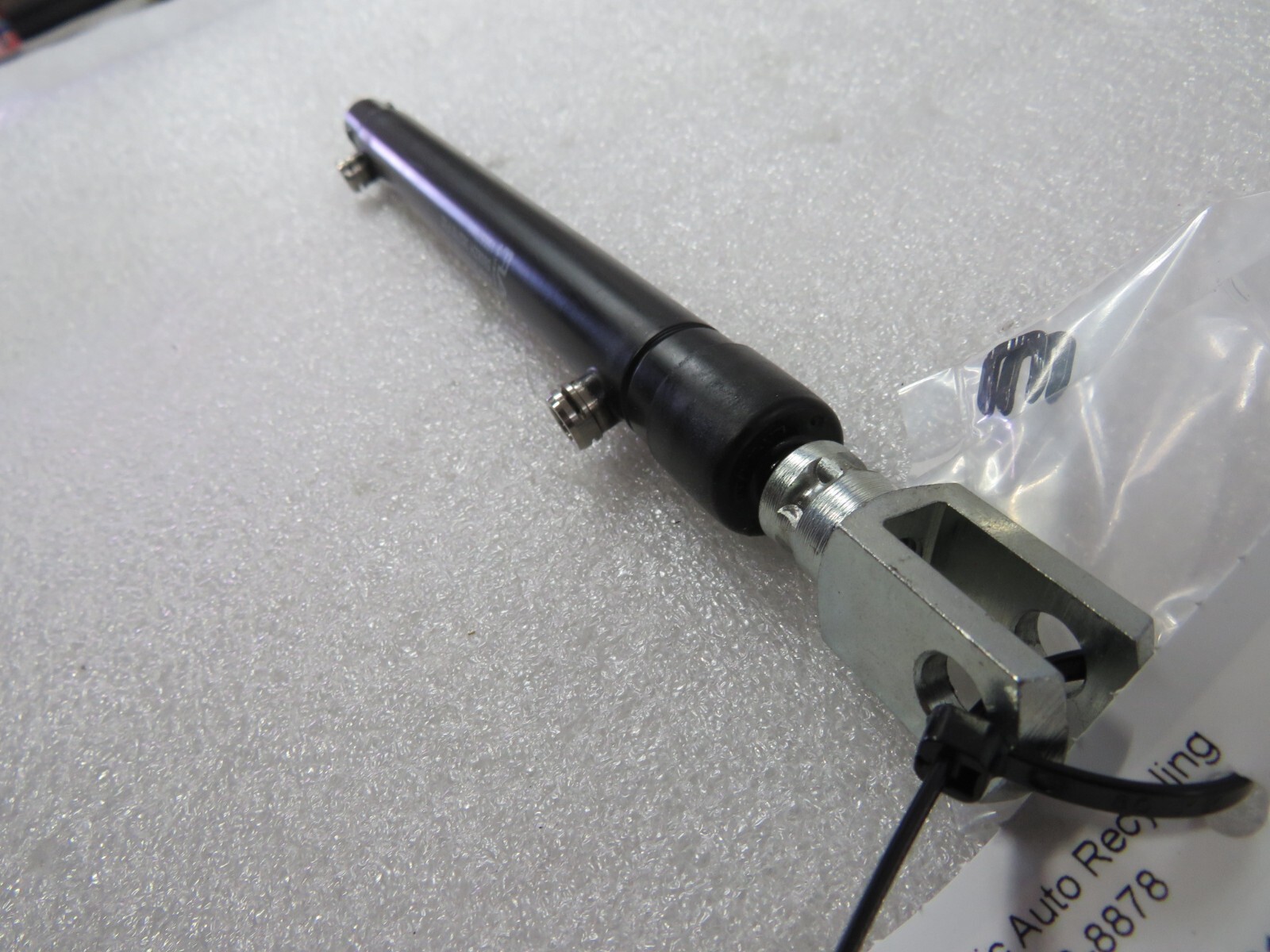 Ferrari California T, LH, Front Convertible Top Lift Cylinder, Used 81860200