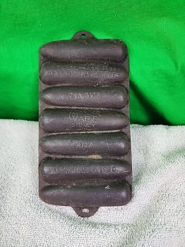 WAGNER WARE SIDNEY -0- KRUSTY KORN KOB PAN- TEA SIZE; #1317D July 6, 1920