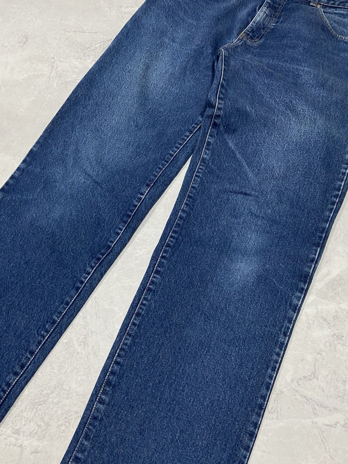 Jeans lavaggio Yves Saint Laurent pantaloni denim YSL metallo logo tasca vintage