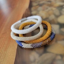 Set Of Shaska Nepal Beaded Roll On Bracelets With Love Charm