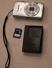 Canon PowerShot ELPH 135 Silver Camera 8X Optical Zoom Battery, Charger, SD Card