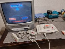 Console GX 4000 - Amstrad GX4000 2 manettes et 2 Jeux burning rubber Robocop 2