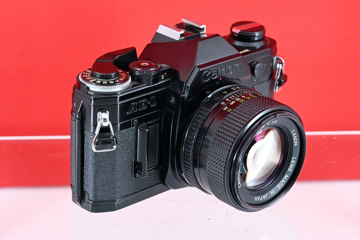 Canon AE-1 Black 35mm Film Camera w/ NFD 50mm f1.4, FD 100-200mm