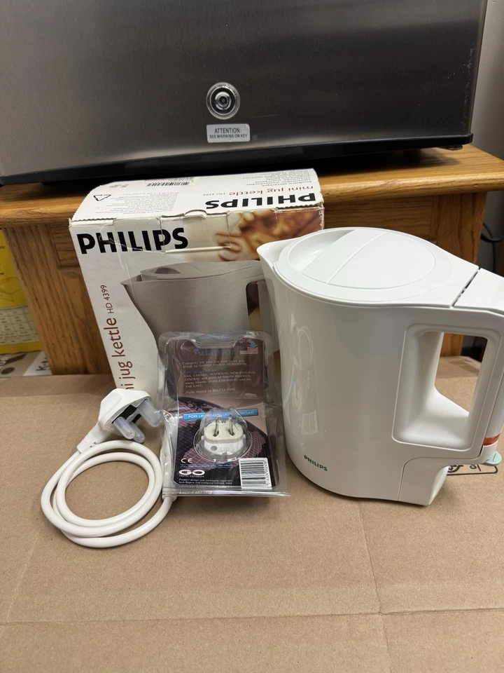 Philips Mini Jarra Hervidor de Agua Eléctrico HD 4399 con Adaptador Trans World Nuevo Foto 3 de 4
