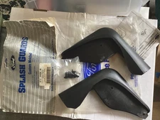SET OF NEW  FORD  TAURUS /  SABLE  SPLASH GUARDS  - -  SEDAN OR  WAGON- -FRONT