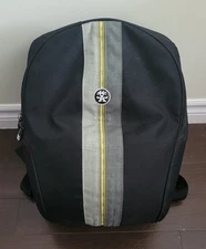 Crumpler Messenger Boy Half Photo BP. Black, green and silver. Backpack. 