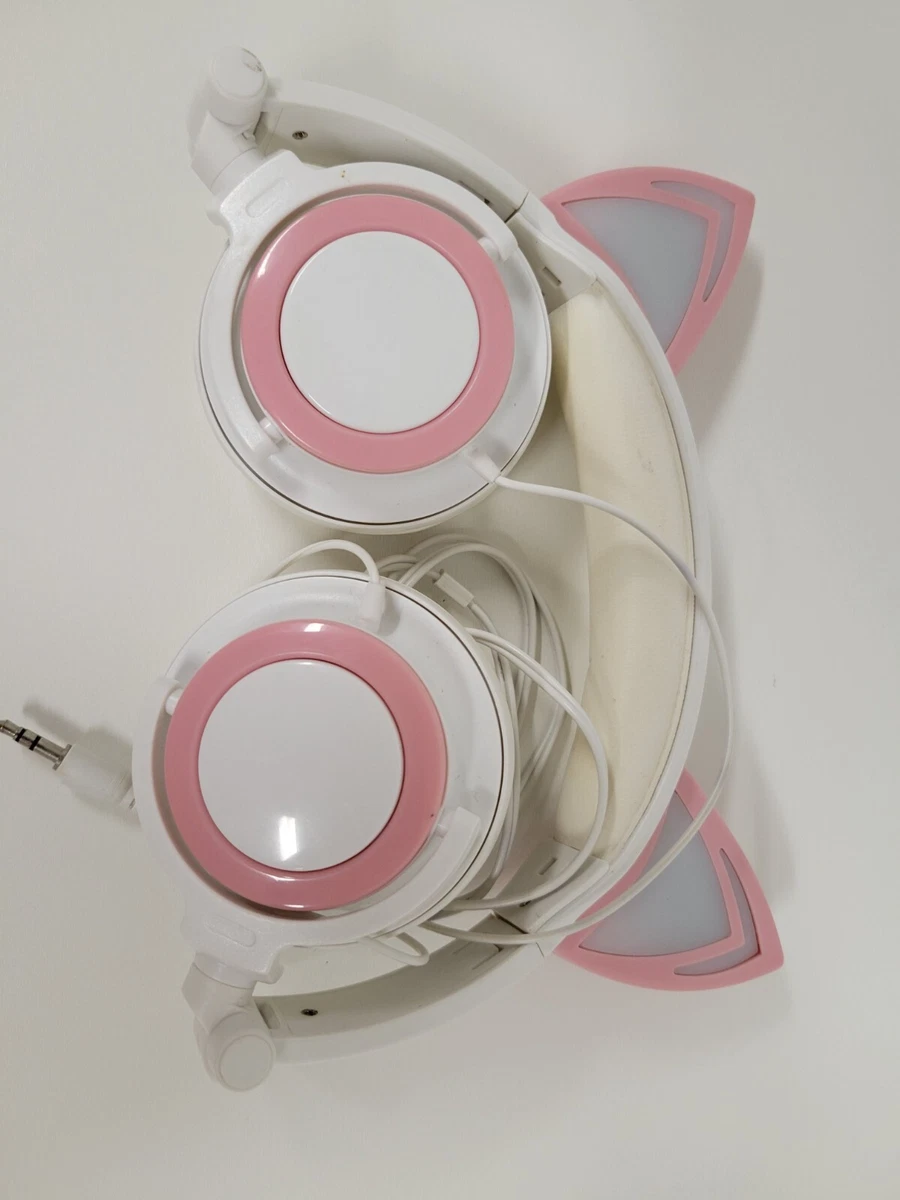 pink and white cat ear headphones