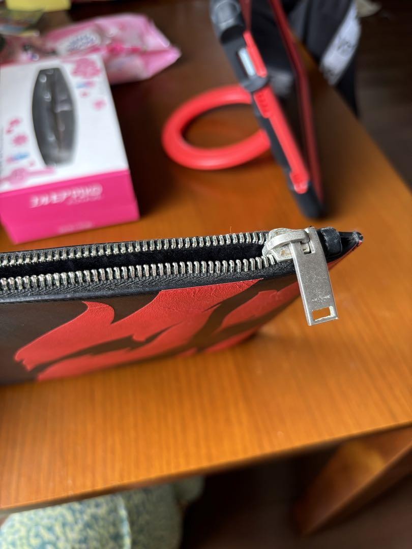 Autentica pochette Saint Laurent modello fiamma pelle nera rossa design unico