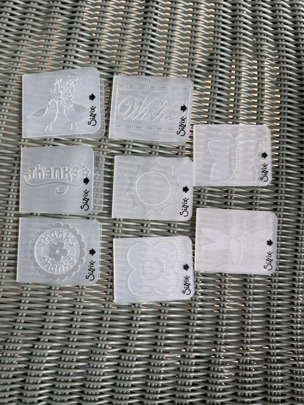 8- Sizzix Mini Embossing Folders. $16