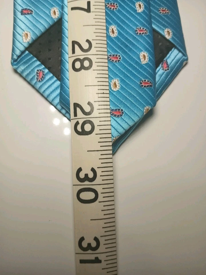 Corbata de seda azul aguamarina Firenze punto cachemir jacquard tejida Italia para hombre lujo Foto 4 de 4