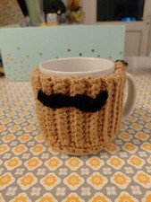 Woolly moustache Cup cosy. Mug hug. Hand crocheted light caramel brown colour