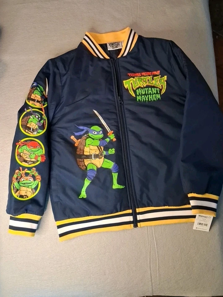 Chaqueta de bombardero Teenage Mutant Ninja Turtles 10/12 AZUL MARINO Bolsillos con cremallera completa Nueva con etiquetas 2024 Foto 2 de 4