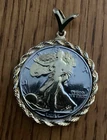 1947 walking liberty half dollar with gold tone rope bezel, coin is 90% silver