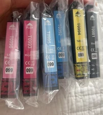 The cartridges shown in the image are Epson T099 series (T0991–T0996)