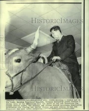 1969 Press Photo Soviet Cosmonaut Georgi Beregovy on Bull in San Francisco