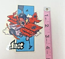 Rare Vintage Lost Man in Bi-Plane Helmet Artillery Vinyl Surf Sticker Decal