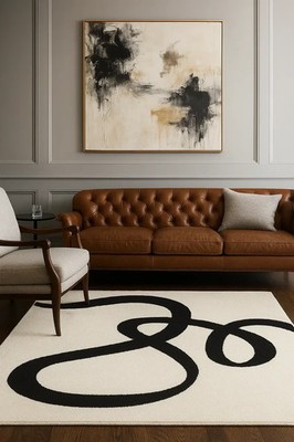hand-tufted rug, crafted from 100% New Zealand wool. Featuring a striking black