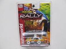 Auto World Slot Car- ULTRA G - White Lightning iWheels '75 Ford Escort