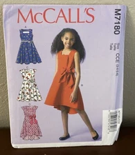 McCall’s Pattern M7180  Girls Dresses 4 Variations Size 3-6 Uncut
