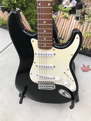 1990's/2000's Squier Strat Black W/White Pickguard Indonesian Made