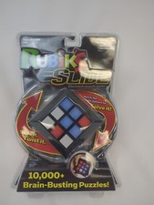 Rubiks Slide Electronic Game 10,000 Brain Busting Puzzles Rubiks Cube NEW
