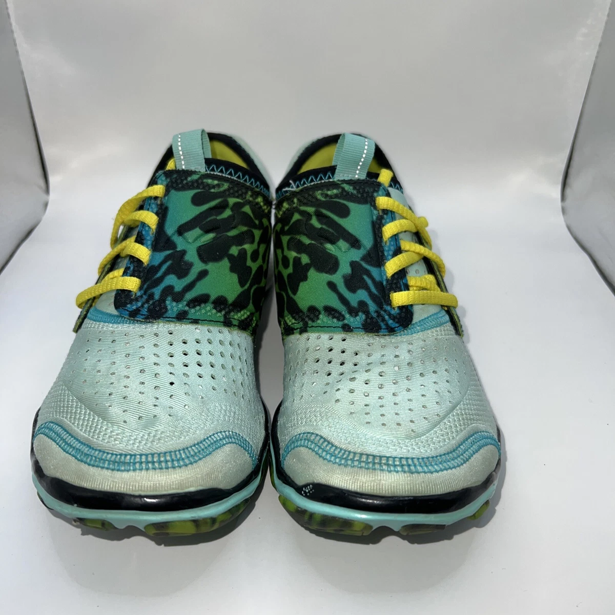 Women's ua micro g toxic six sales running shoes