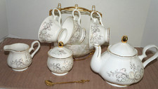 Leisure Time 22 Piece Porcelain Ceramic Tea Set with Rack