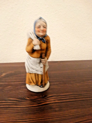 1x kleine Größe - alte Frau - Sack Ornament tragen - Wohnzimmer