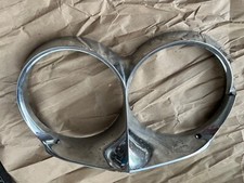 Vintage 1963 Cadillac head light bezel eyelet...