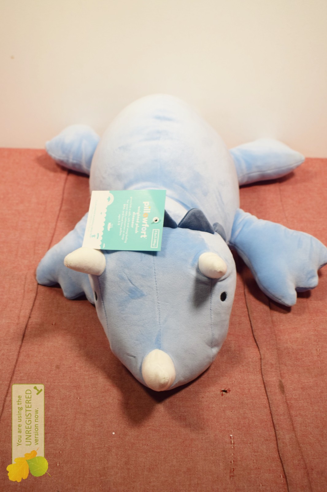 Pillowfort Dinosaur Weighted Plush Kids' Throw Pillow Blue (Damaged)