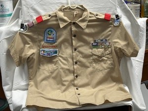 Vintage BSA official uniform shirt with various patches