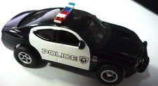 AUTO WORLD POLICE DODGE CHARGER HO Slot Car Xtraction running chassis