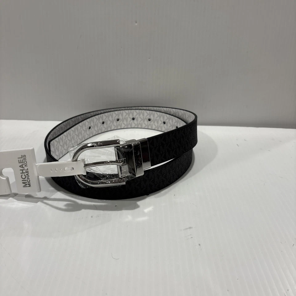 CINTURÓN DE CUERO REVERSIBLE MICHAEL KORS LOGOTIPO MK NEGRO/BLANCO CON HEBILLA PLATEADA Talla M Foto 3 de 4