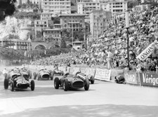 Jean Behra Ferrari 246 leads Stirling Moss Cooper T51 Climax at th- 1959 Photo