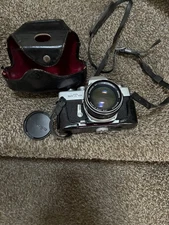 Minolta SRT 101 35 MM SLR Camera with 58 MM  f/1.7 Rokkor-PF Lens