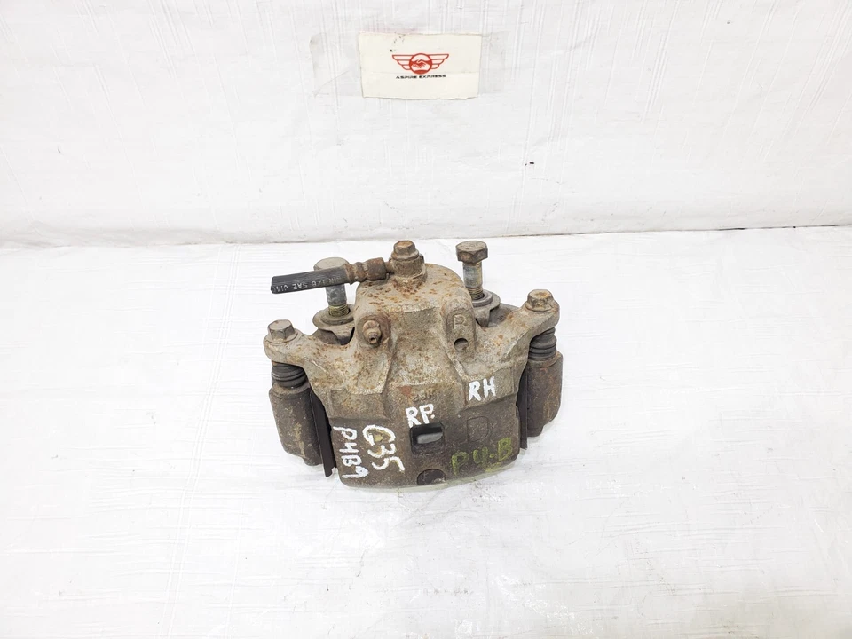 Pinza de freno delantera derecha lado del pasajero Infiniti G35 2003-2005 OEM 41001-AM000 Foto 2 de 4