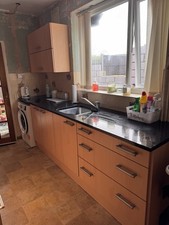 Light oak kitchen With black Quartz Worktop Great Condition