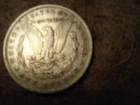 1887 Morgan Silver Dollar, lines are good, no markings , fine